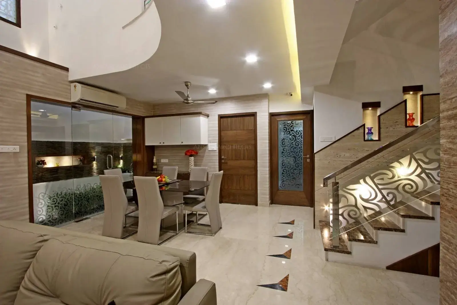 The dining area overlooks the courtyard for a better view and veneer finishes highlight the area.