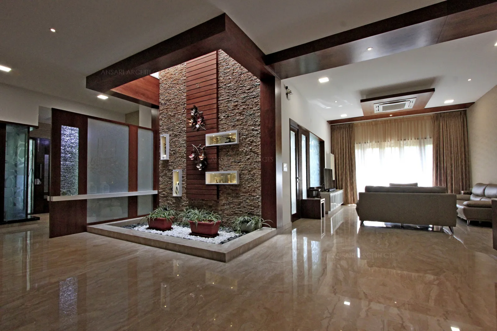 The marble flooring is sumptuous, courtyard has been delineated with levels setting distinct flooring level.