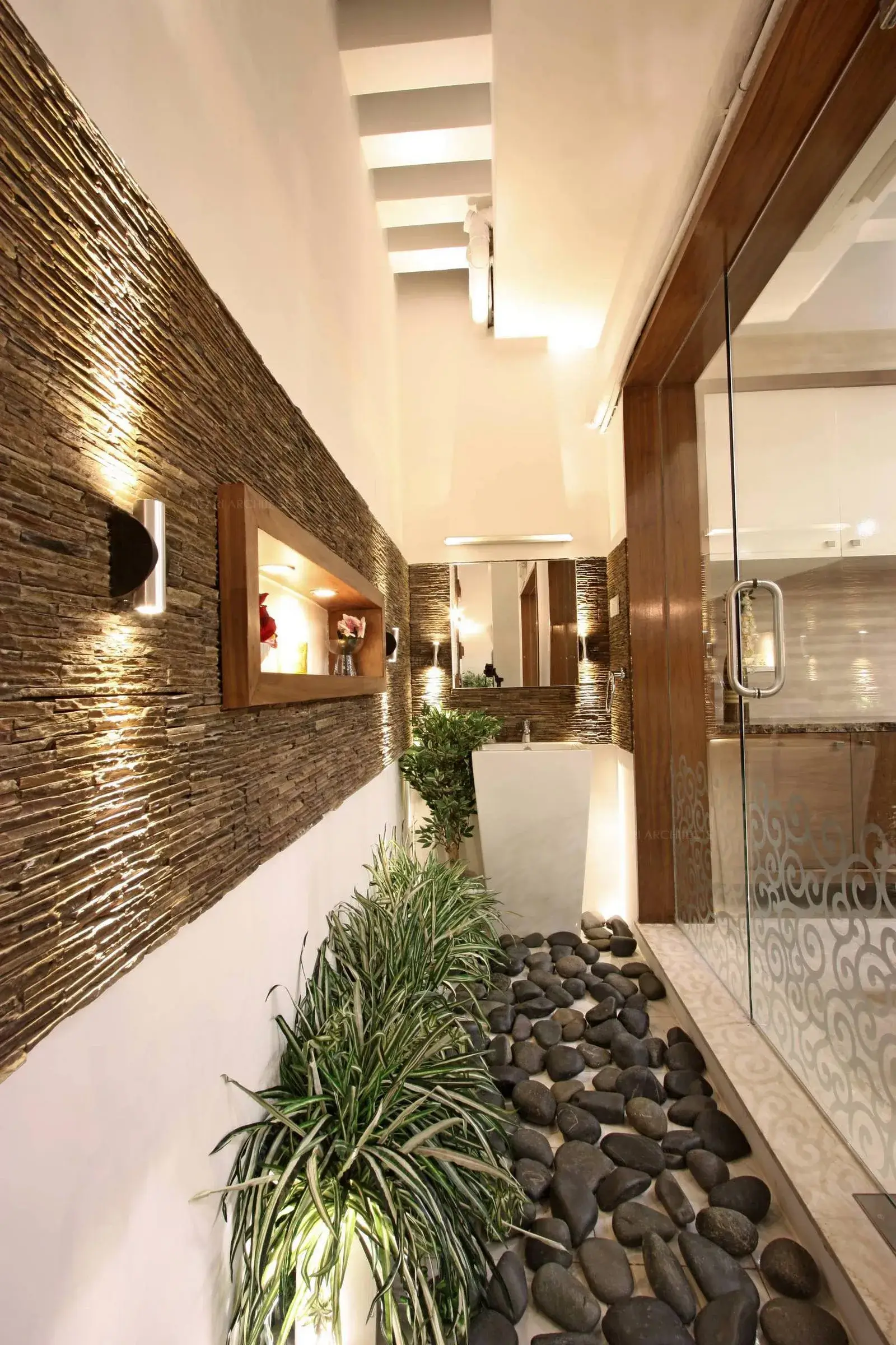 A mirror unit along with an handwash area is provided at the end of the courtyard
