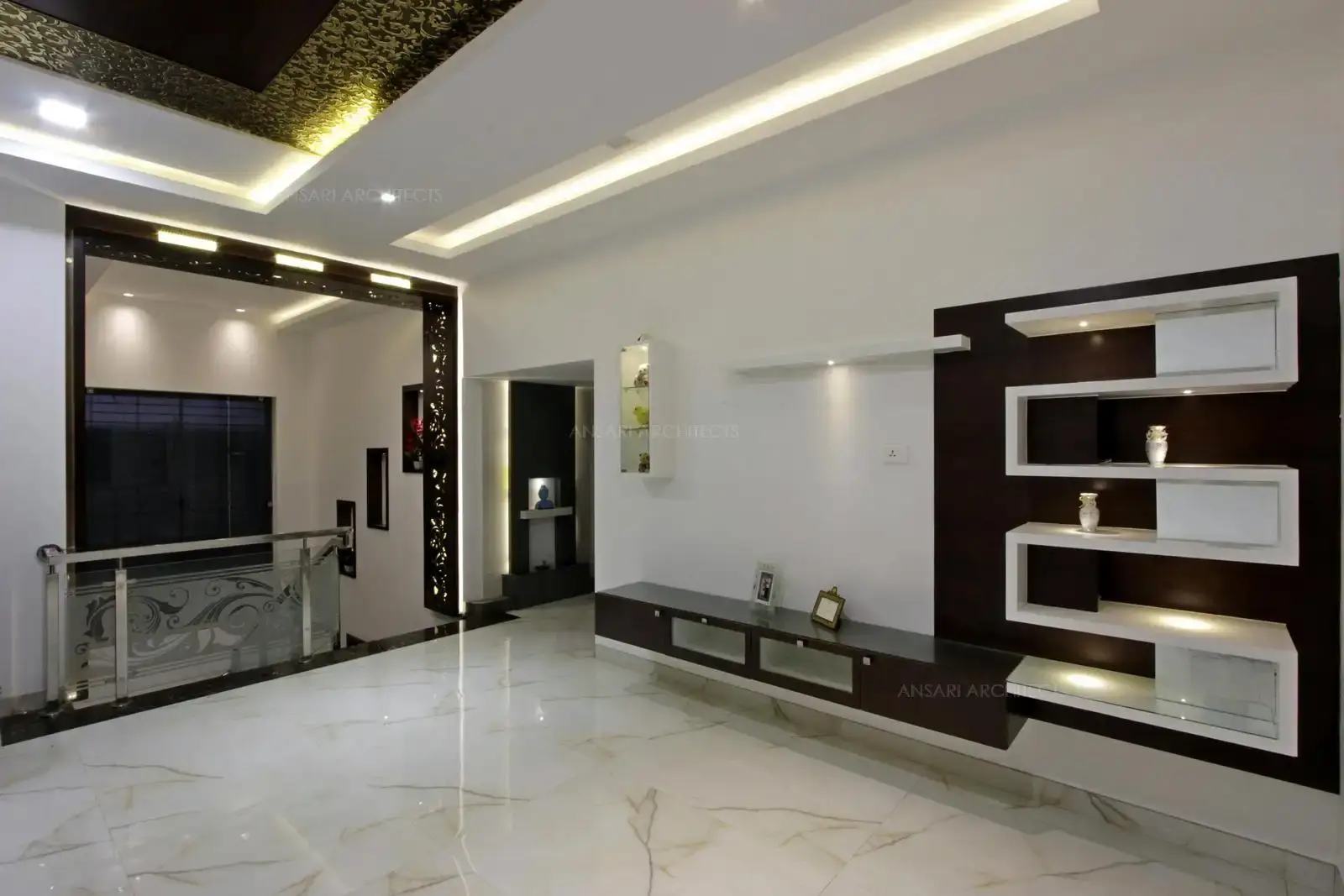 Ornate and plush furnishings wooden panels with specific design display units and side tables contrast in a single room.