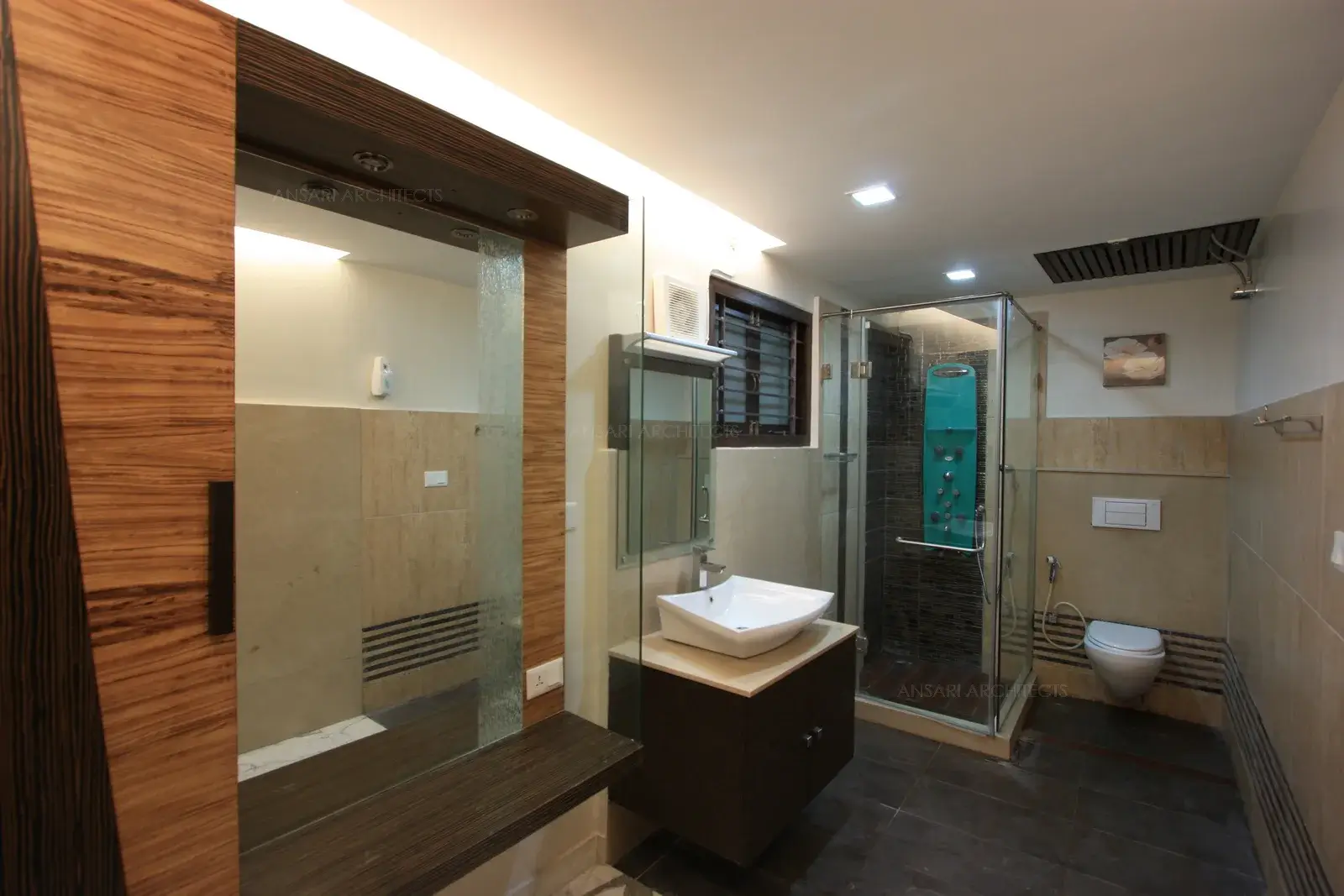 Shower cubical in this toilet of bedroom-5 divides the wet and dry area.